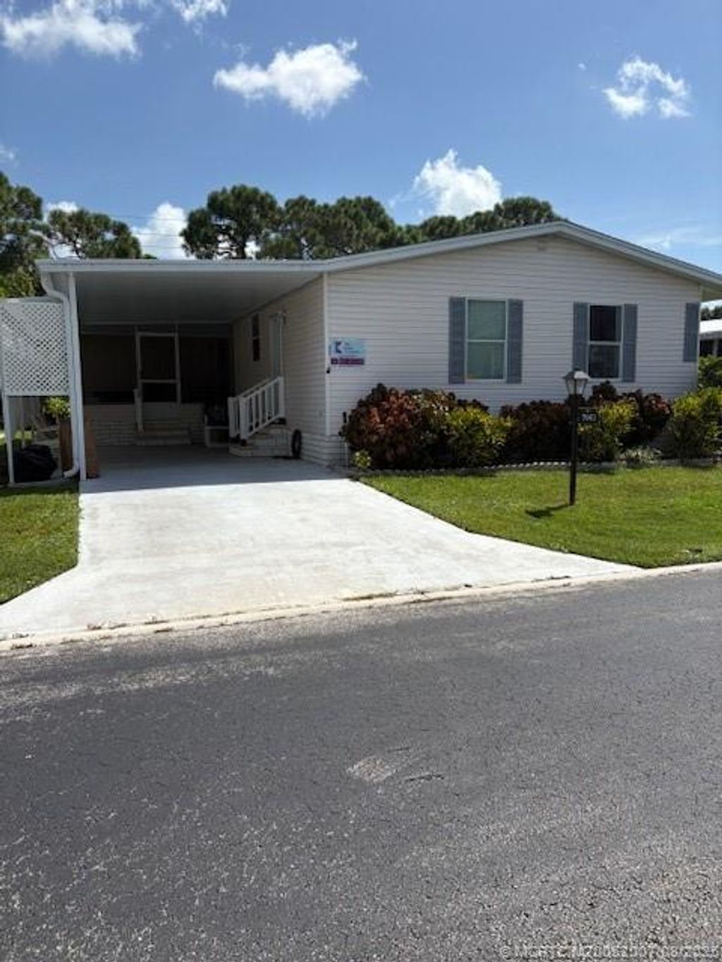 Photo of 7061 SE Birchwood Lane, Stuart, FL 34997 (MLS # M20052007)