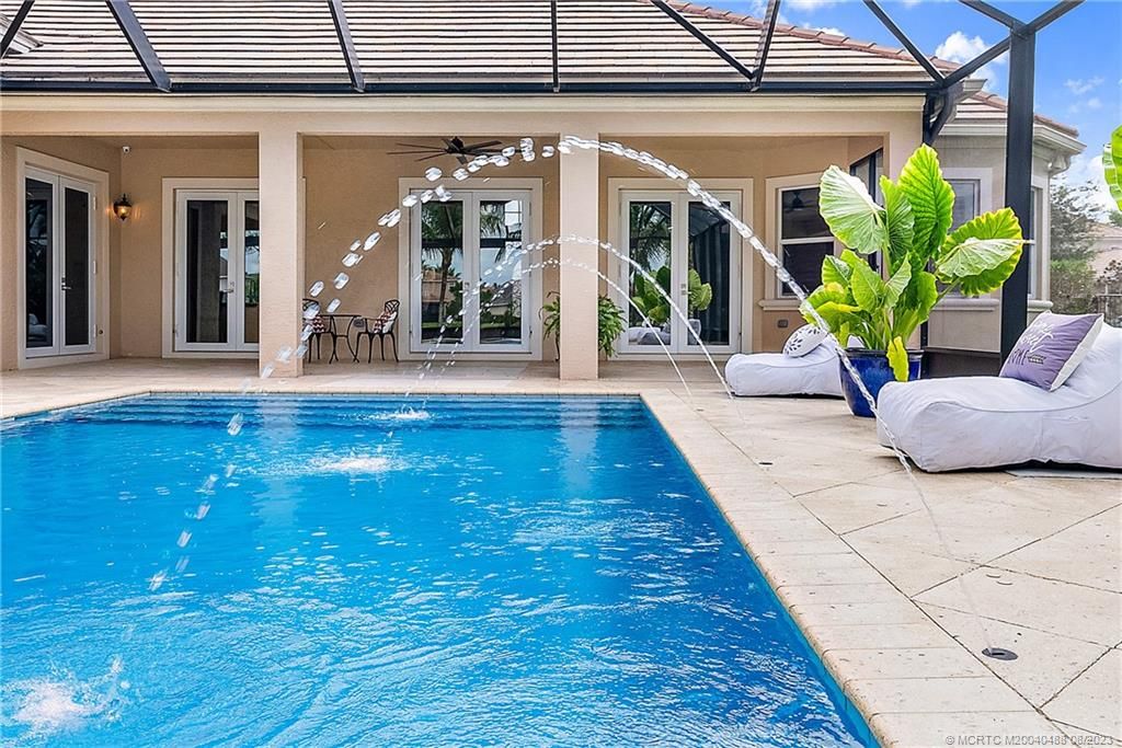 Photo of 844 SW Habitat Lane, Palm City, FL 34990 (MLS # M20040488)