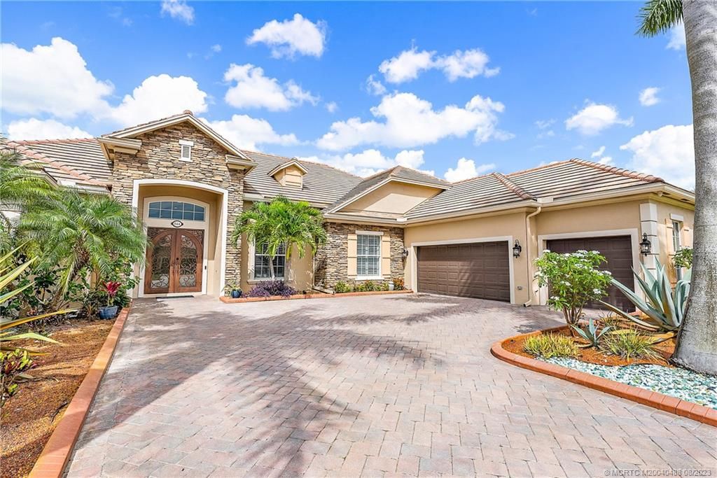 Photo of 844 SW Habitat Lane, Palm City, FL 34990 (MLS # M20040488)