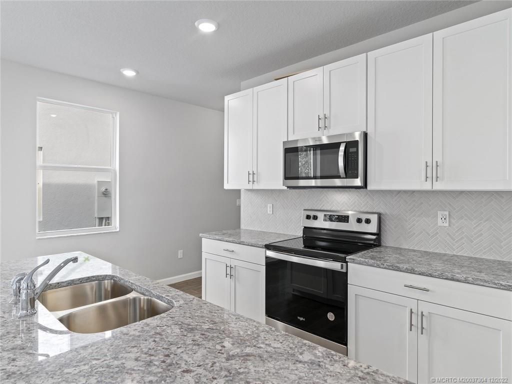 Photo of 236 Osprey Preserve Boulevard, Jensen Beach, FL 34957 (MLS # M20037304)