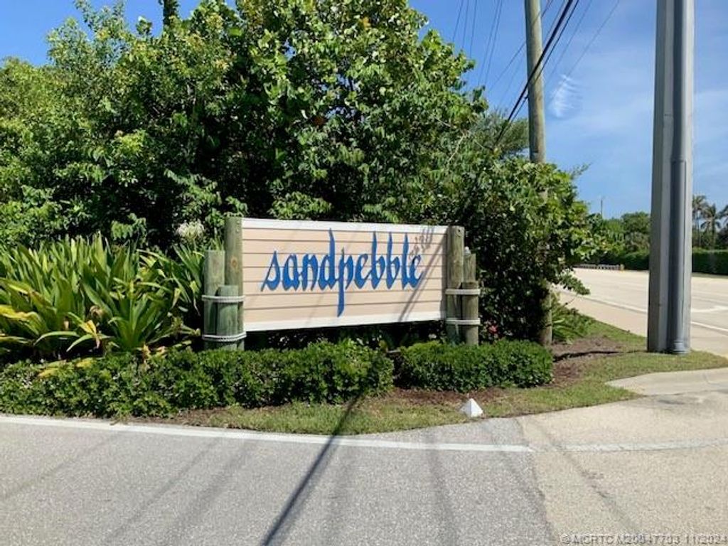 Photo of 4720 NE Sandpebble Trace #101, Stuart, FL 34996 (MLS # M20047703)