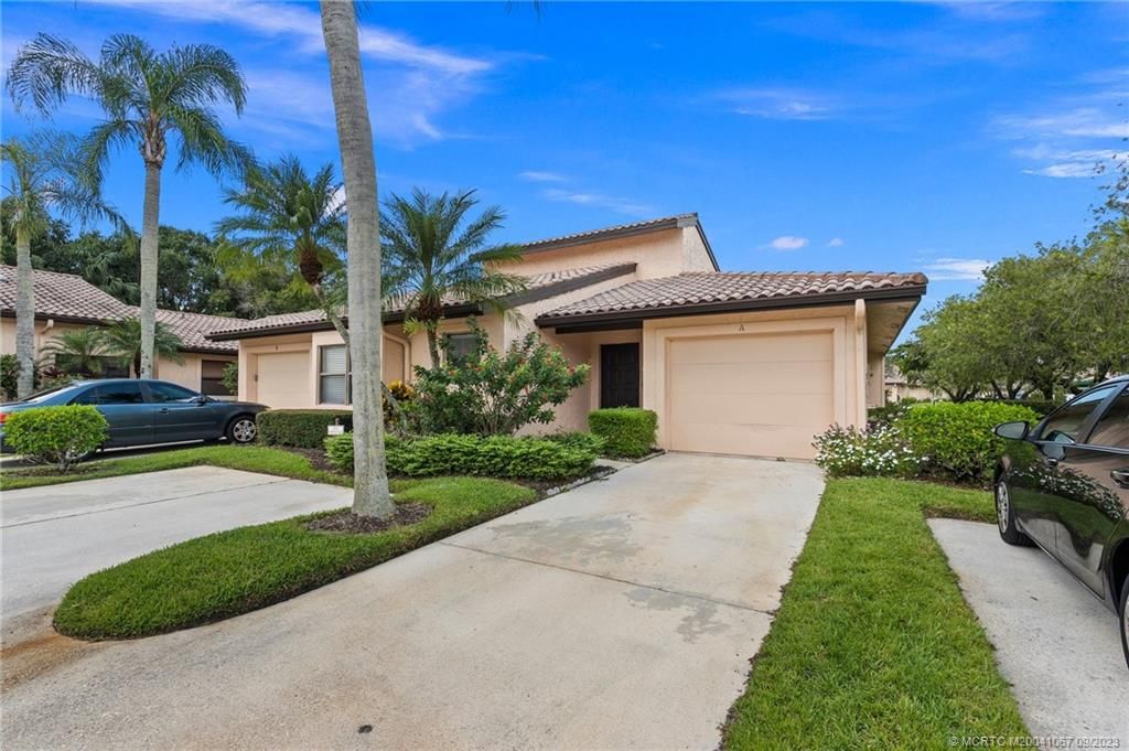 Photo of 3664 SW Quail Meadow Trail #A, Palm City, FL 34990 (MLS # M20041067)