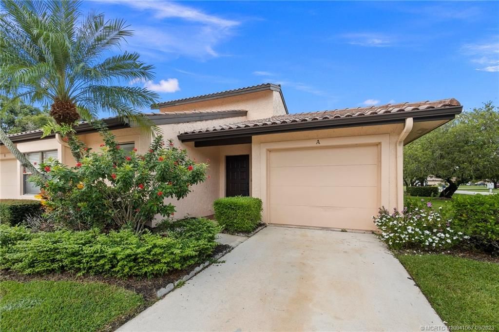 Photo of 3664 SW Quail Meadow Trail #A, Palm City, FL 34990 (MLS # M20041067)