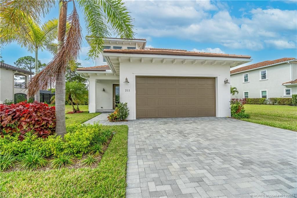 Photo of 211 SE Via Bisento, Port Saint Lucie, FL 34952 (MLS # M20047416)
