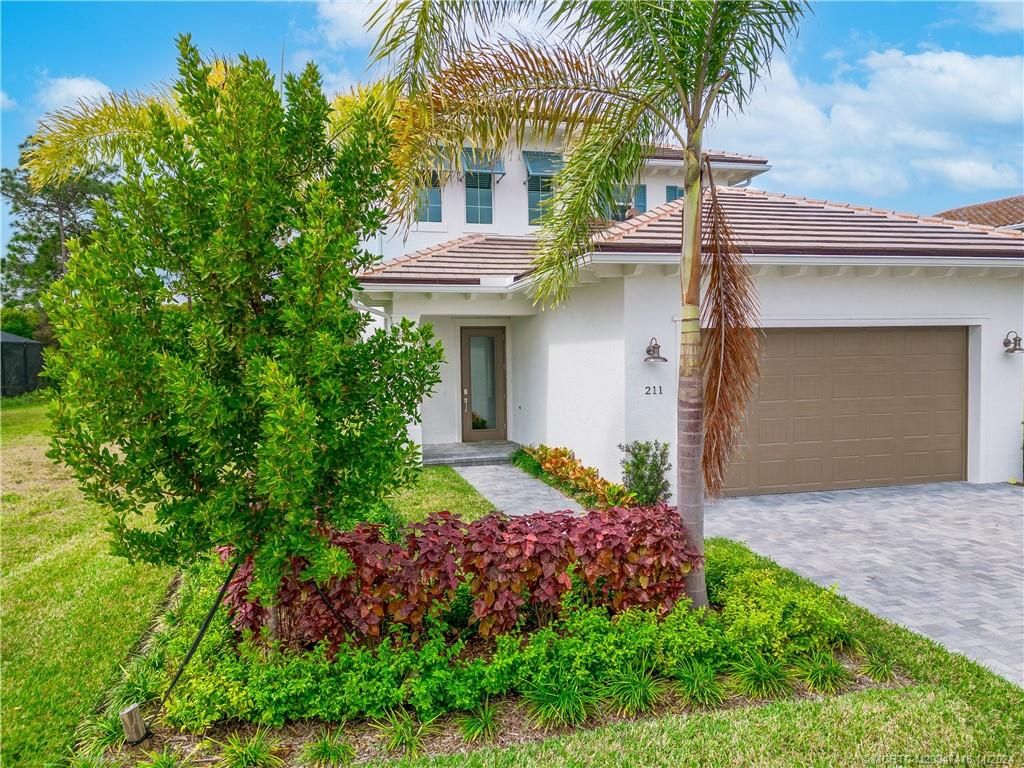 Photo of 211 SE Via Bisento, Port Saint Lucie, FL 34952 (MLS # M20047416)