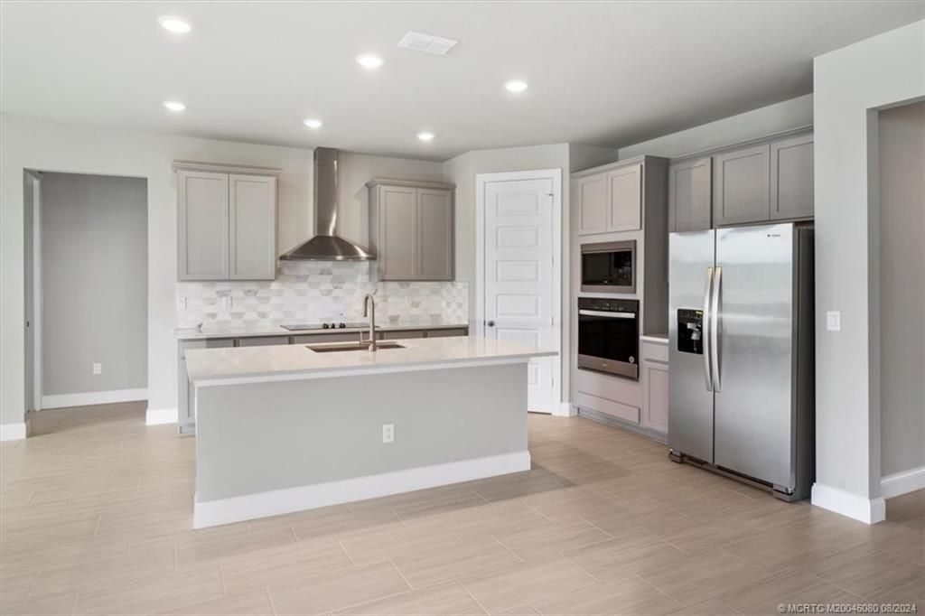 Photo of 6326 NW Sweetwood Drive, Port Saint Lucie, FL 34987 (MLS # M20046080)