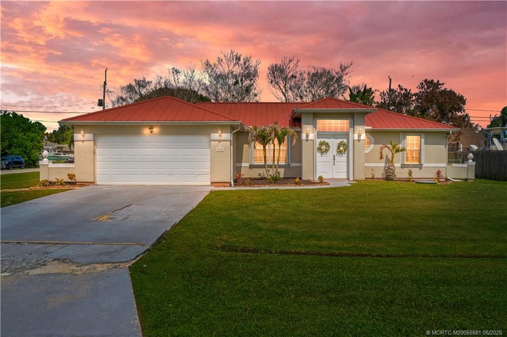 Photo of 2874 SE Rawlings Road, Port Saint Lucie, FL 34952 (MLS # M20055561)