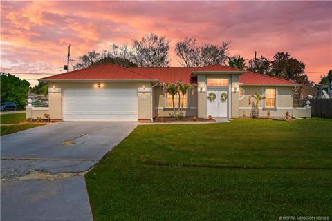 Photo of 2874 SE Rawlings Road, Port Saint Lucie, FL 34952 (MLS # M20055561)
