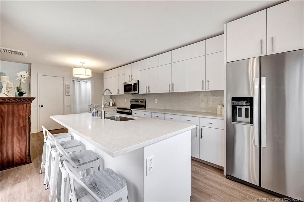 Photo of 3229 SW Sunset Trace Circle, Palm City, FL 34990 (MLS # M20042725)