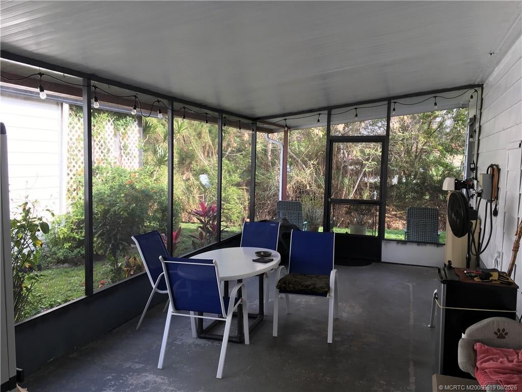 Photo of 14681 SW Divot Drive #A-11, Indiantown, FL 34956 (MLS # M20056519)