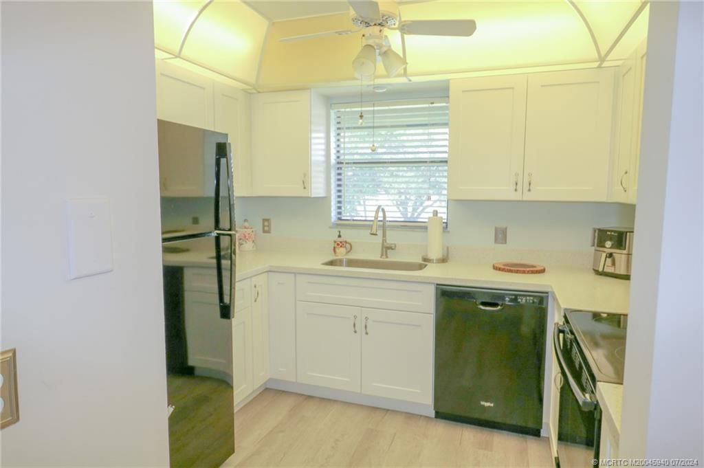 Photo of 31 SW South River Drive #203, Stuart, FL 34997 (MLS # M20045940)