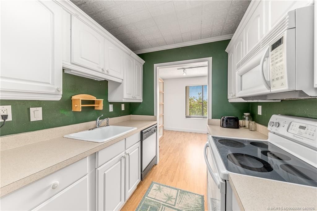 Photo of 5393 SE Miles Grant Road #207, Stuart, FL 34997 (MLS # M20055061)