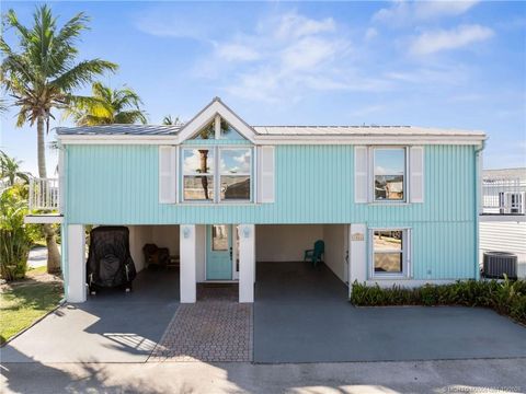 Photo of 1084 Nettles Boulevard, Jensen Beach, FL 34957 (MLS # M20051861)