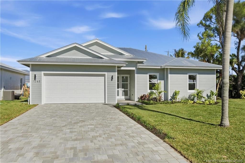 Photo of 1063 NW 12th Terrace, Stuart, FL 34994 (MLS # M20053507)