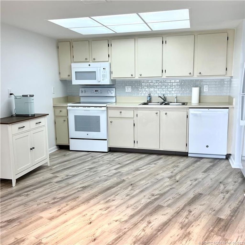 Photo of 2083 NE Collins Circle #8-30, Jensen Beach, FL 34957 (MLS # M20039741)