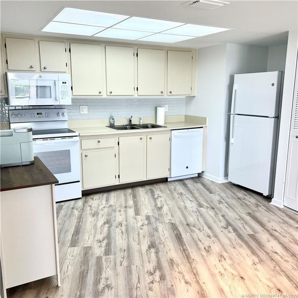 Photo of 2083 NE Collins Circle #8-30, Jensen Beach, FL 34957 (MLS # M20039741)