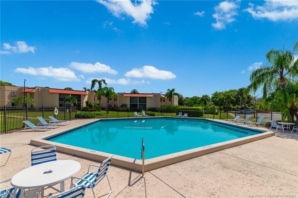 Photo of 2083 NE Collins Circle #8-30, Jensen Beach, FL 34957 (MLS # M20039741)