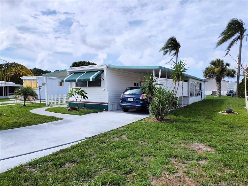 Photo of 165 SE Trafalgar Terrace, Stuart, FL 34994 (MLS # M20045700)