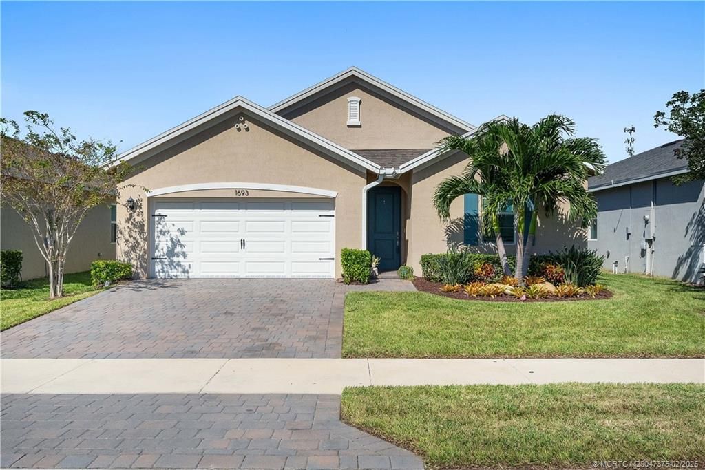 Photo of 1693 NE White Pine Terrace, Jensen Beach, FL 34957 (MLS # M20047375)