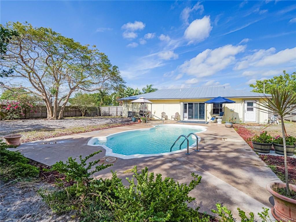 Photo of 679 SE Forgal Street, Port Saint Lucie, FL 34983 (MLS # M20044335)