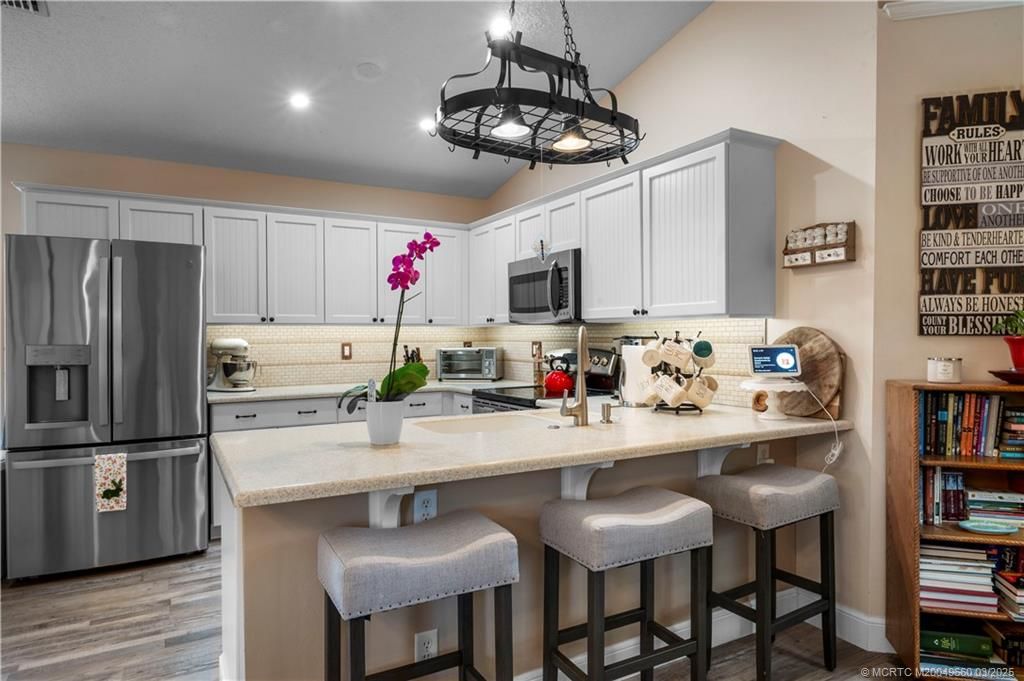 Photo of 2844 SW Regal Terrace, Stuart, FL 34997 (MLS # M20049660)