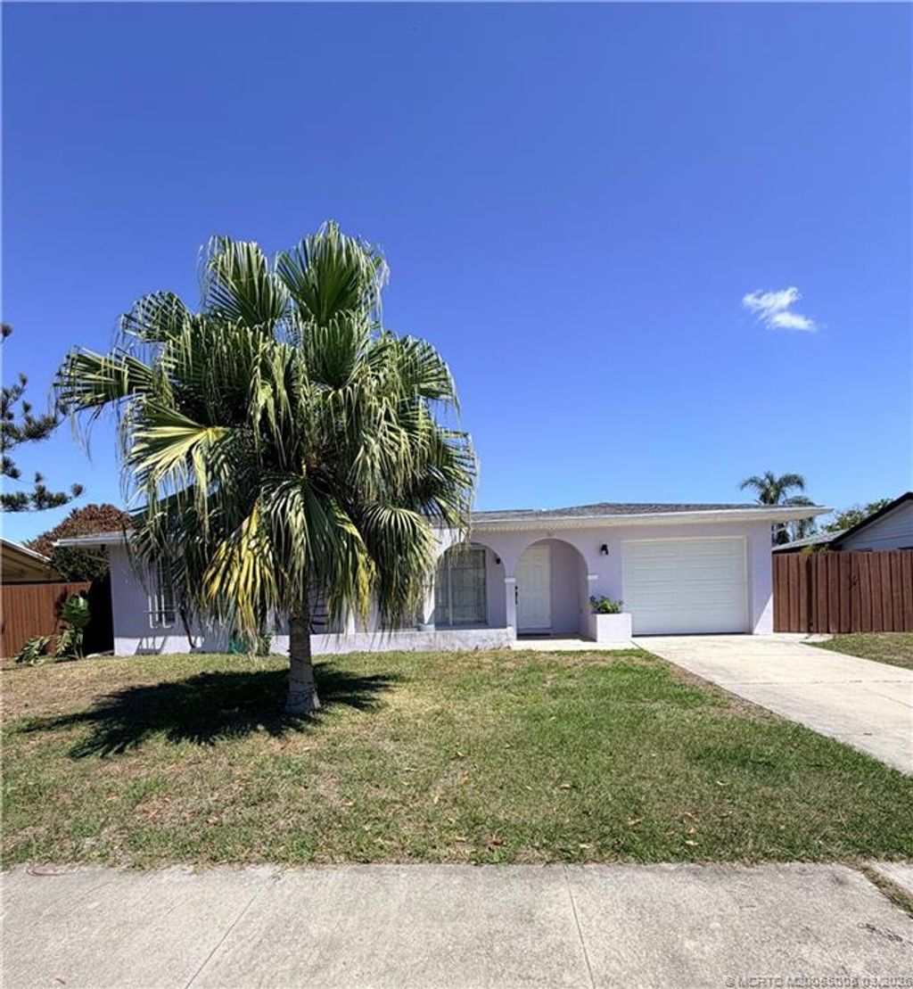 Photo of 761 SW Ravenswood Lane, Port Saint Lucie, FL 34983 (MLS # M20055005)