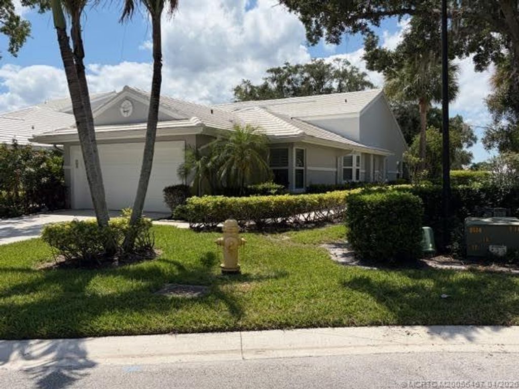 Photo of 2438 SW Foxpoint Trail, Palm City, FL 34990 (MLS # M20055467)