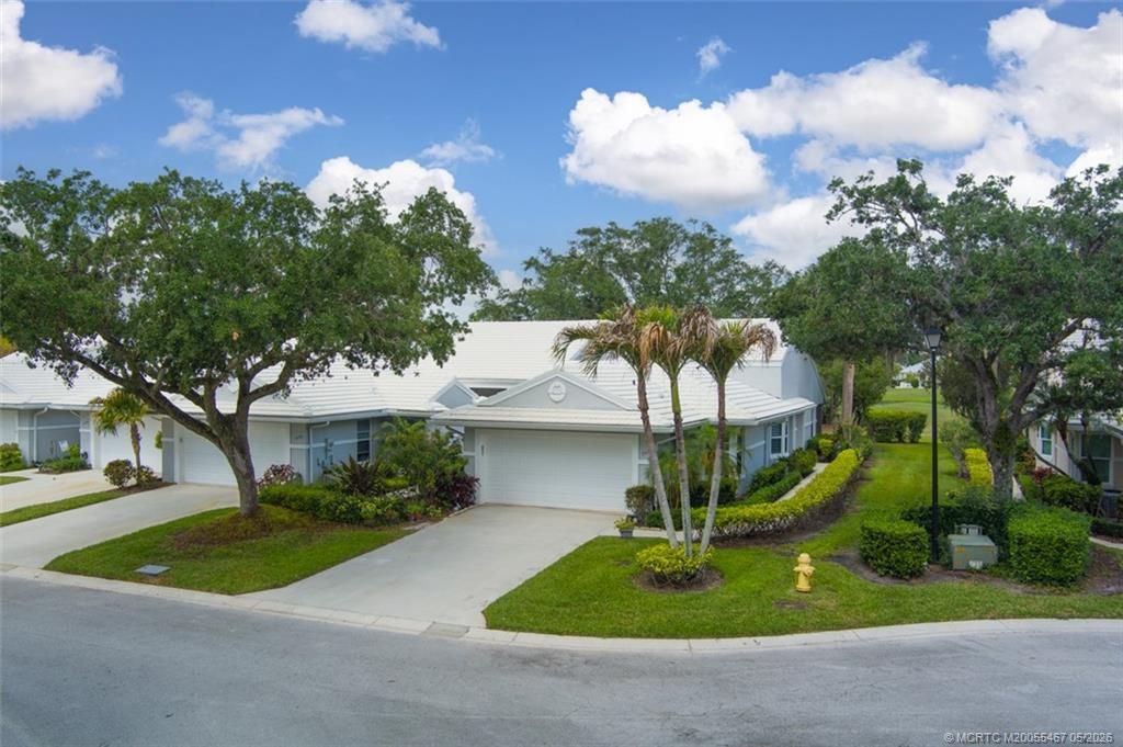 Photo of 2438 SW Foxpoint Trail, Palm City, FL 34990 (MLS # M20055467)