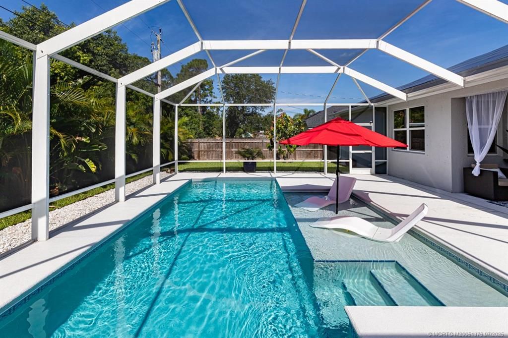 Photo of 1058 SW Dartmouth Avenue, Port Saint Lucie, FL 34953 (MLS # M20051376)