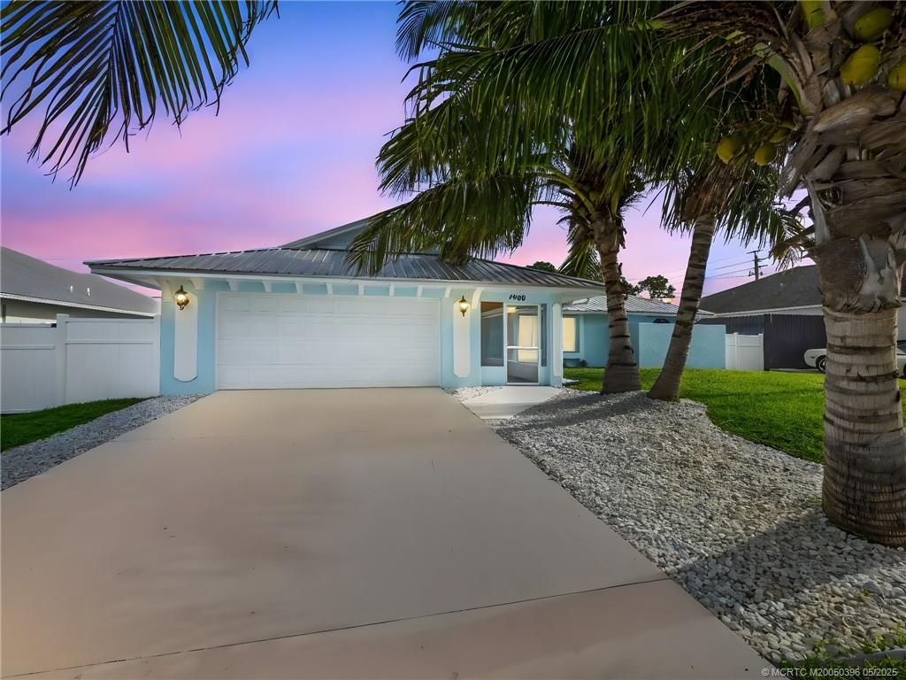 Photo of 1409 SW Aachen Avenue, Port Saint Lucie, FL 34953 (MLS # M20050396)