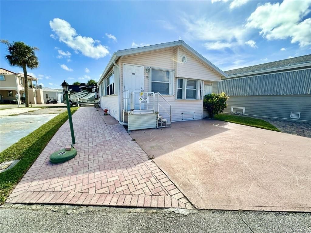 Photo of 110 Nettles Boulevard, Jensen Beach, FL 34957 (MLS # M20048537)