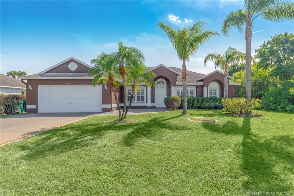 Photo of 458 SE Essex Drive, Port Saint Lucie, FL 34984 (MLS # M20044167)