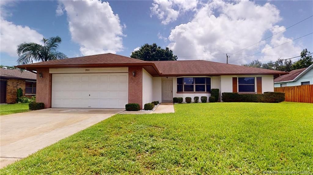 Photo of 2881 SE Nance Street, Port Saint Lucie, FL 34984 (MLS # M20053610)