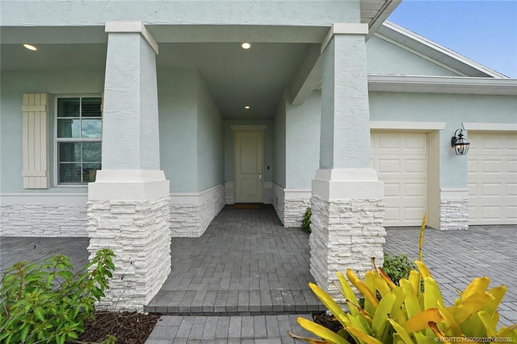 Photo of 12220 SW Roma Circle, Port Saint Lucie, FL 34987 (MLS # M20056100)