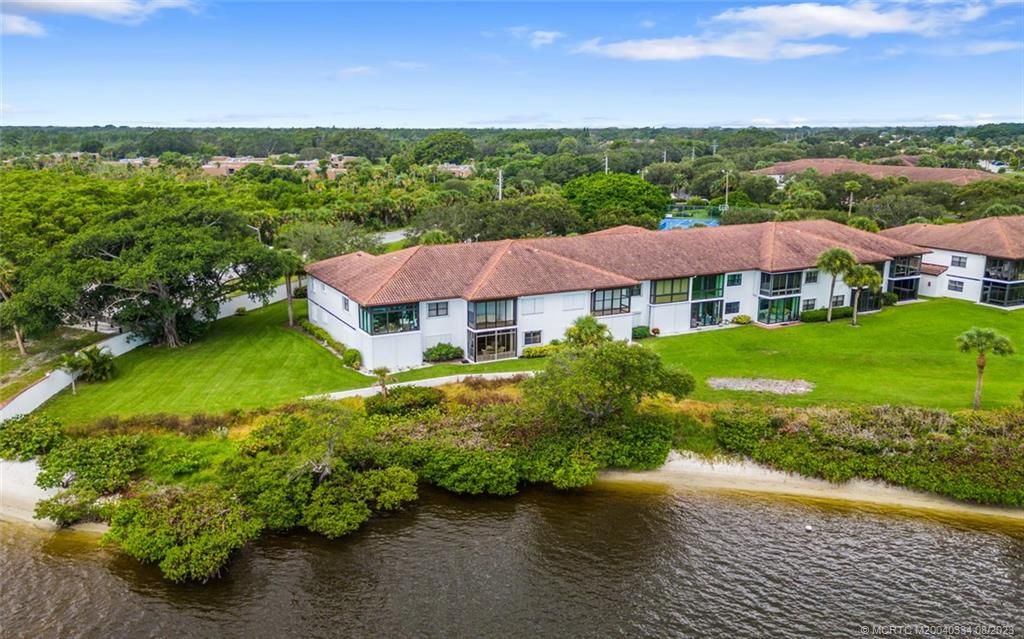 Photo of 6082 SE Landing Way #13-7, Stuart, FL 34997 (MLS # M20040334)