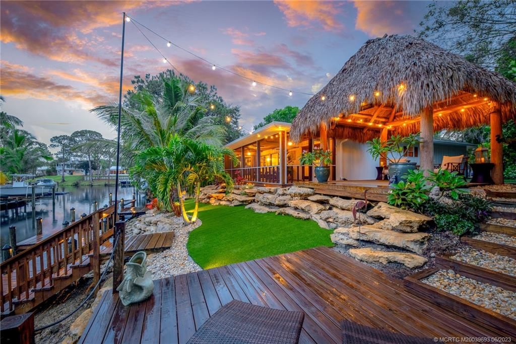 Photo of 1397 SW Peninsula Lane, Palm City, FL 34990 (MLS # M20039693)