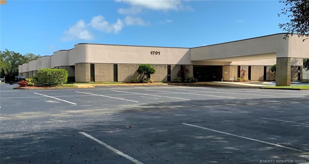 Photo of 1701 SE Hillmoor Drive, Port Saint Lucie, FL 34952 (MLS # M20047038)