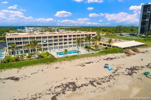 Photo of 9800 S Ocean Drive #107, Jensen Beach, FL 34957 (MLS # M20051389)