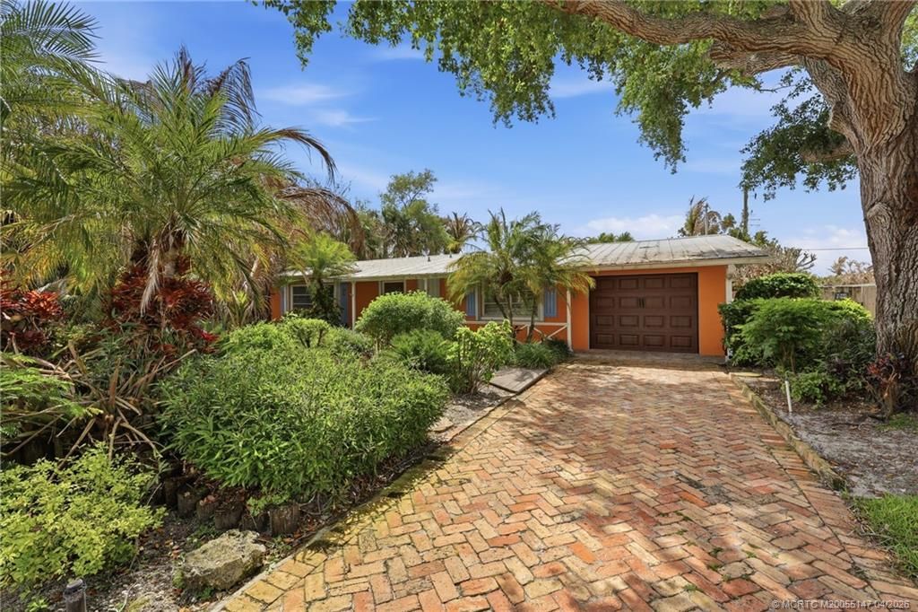 Photo of 1038 NE Hansen Terrace, Jensen Beach, FL 34957 (MLS # M20055147)