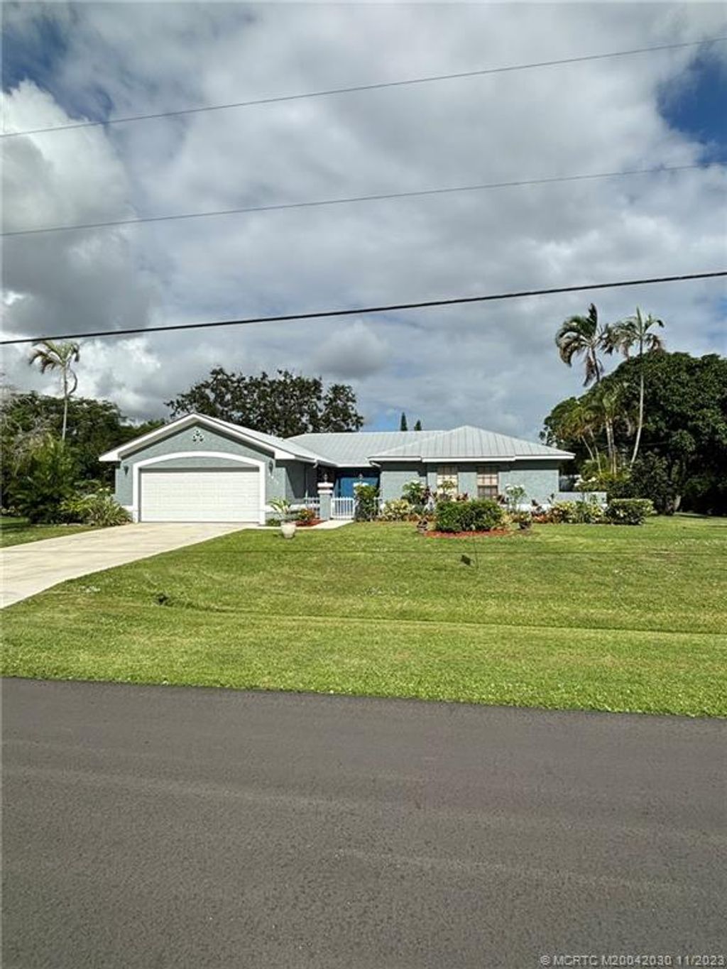 Photo of 2017 SE Van Kleff Avenue, Port Saint Lucie, FL 34952 (MLS # M20042030)