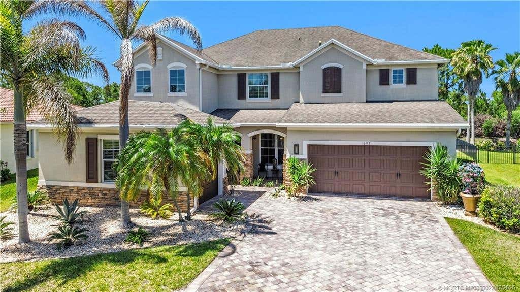 Photo of 697 SW Sun Circle, Palm City, FL 34990 (MLS # M20056022)
