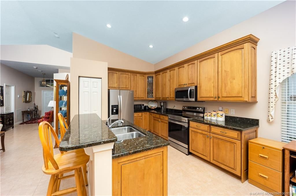 Photo of 4922 SE Devenwood Way, Stuart, FL 34997 (MLS # M20050999)