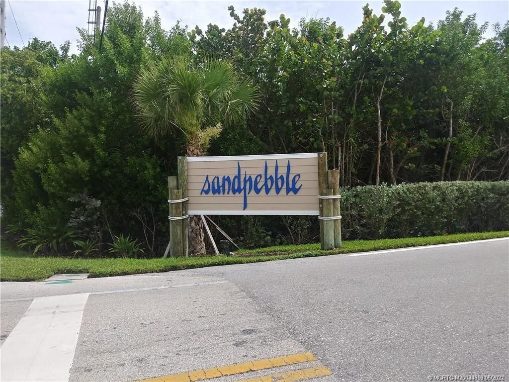 Photo of 4620 NE Sandpebble Trace #405, Stuart, FL 34996 (MLS # M20034519)