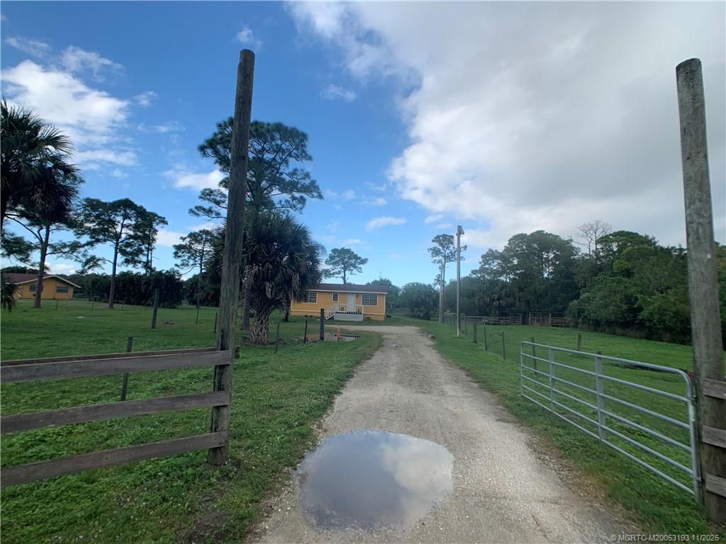 Photo of 6105 SW Gator Trail #A, Palm City, FL 34990 (MLS # M20053193)