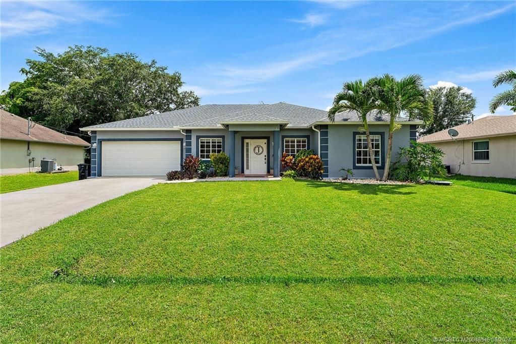 Photo of 222 SW Ewing Avenue, Port Saint Lucie, FL 34983 (MLS # M20046345)