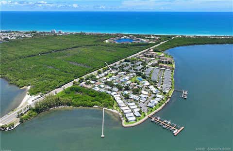 Photo of 3302 NE Spinnaker Way, Jensen Beach, FL 34957 (MLS # M20055871)