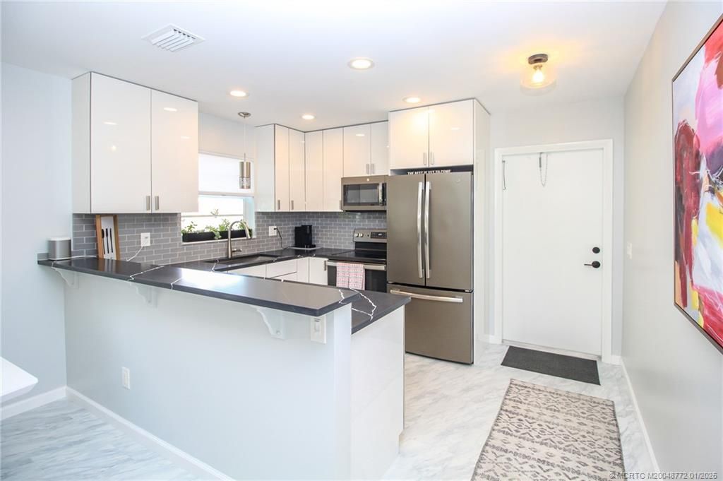 Photo of 2600 SE Ocean Boulevard #FF1, Stuart, FL 34996 (MLS # M20048772)