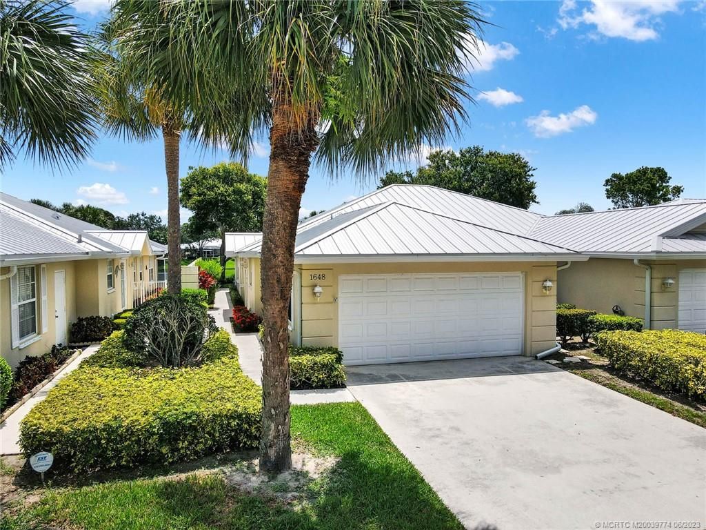 Photo of 1648 SW Waterfall Boulevard, Palm City, FL 34990 (MLS # M20039774)