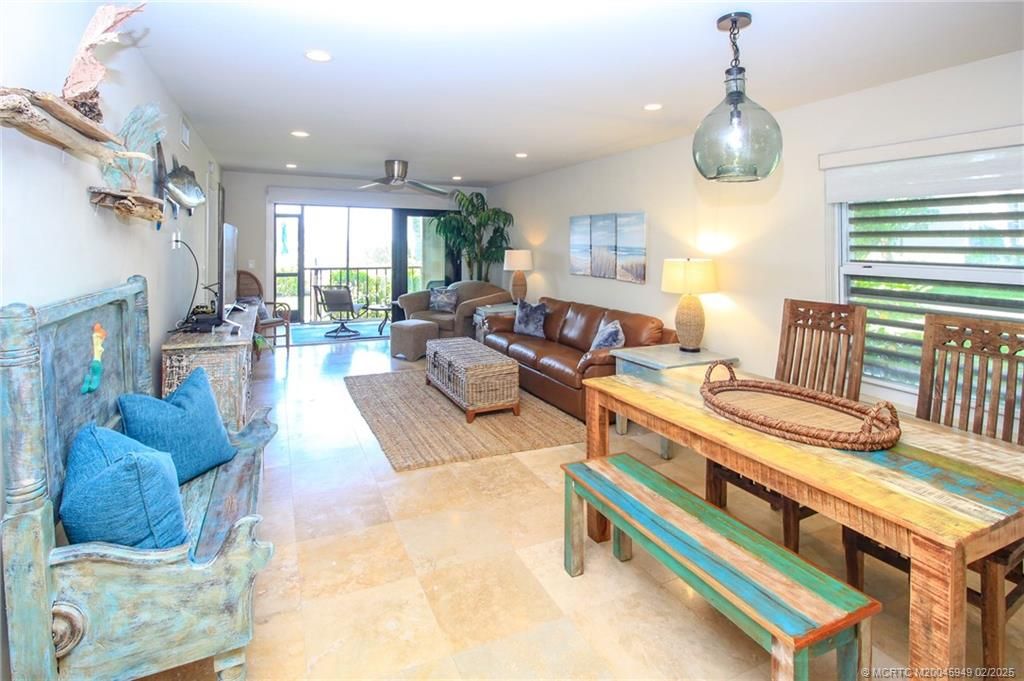 Photo of 4540 NE Sandpebble Trace #106, Stuart, FL 34996 (MLS # M20045949)