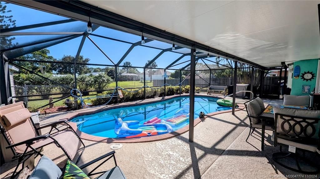 Photo of 2169 SE Dolphin Road, Port Saint Lucie, FL 34952 (MLS # M20047774)